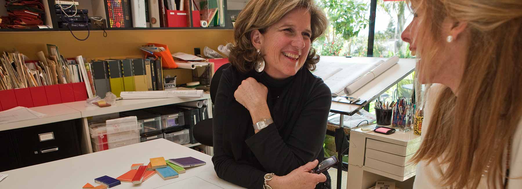 Kay Heizman meeting client in studio